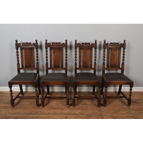 441 - A set of seven oak dining chairs with carved barley twist design manufactured by Sheard Binnington &... 