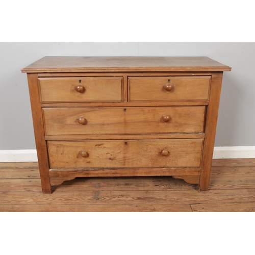 446 - A pine chest of drawers with brass escutcheons.

Hx79cm
Wx109cm
Dx46cm