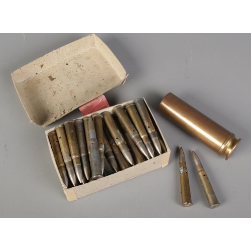 425 - 30mm Aden HV Cannon Shell with 48 Drill Cartridges .303 inch D Mark IX Ammunition Box.
CANNOT POST