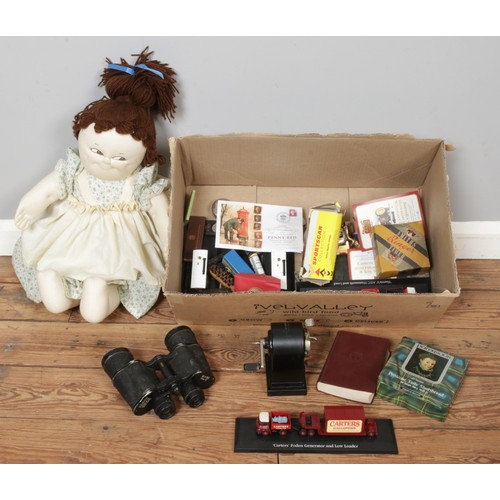 235 - A large box of collectables including Zenith binoculars, Atlas Edition diecast models, The Imperfora... 