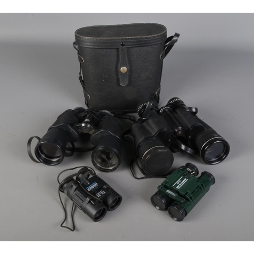 150 - A collection of binoculars including Prinzlux Extralite, Mark Scheffel De Luxe Optics, Practica and ... 