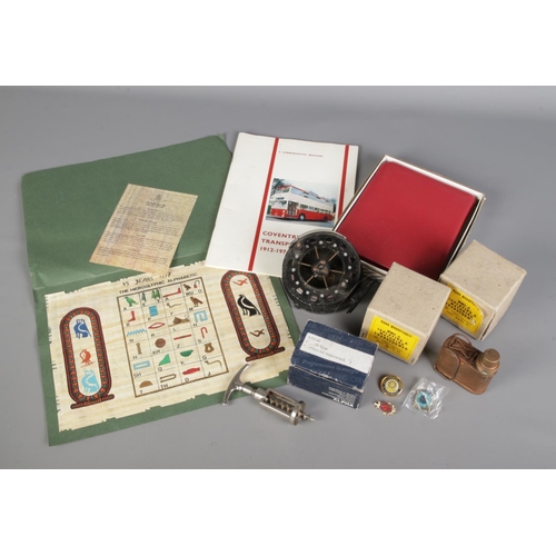 209 - A box of miscellaneous. Includes vintage fishing reel, Rank Wharfedale transformer, Britinol cannist... 