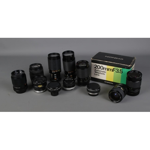 237 - A collection of assorted camera lenses to include boxed Chinon 200mm Automatic Telephoto, Miranda, T... 