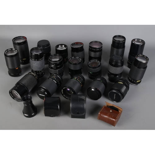 238 - Group of camera lenses by various makers, together with converters and other accessories, including ... 