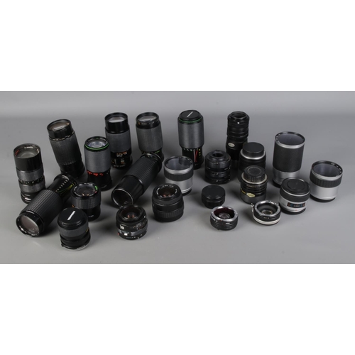 242 - A collection of assorted camera lenses to include Miranda, Vivitar, Hanimex, Tamron, Prinzflex, etc.