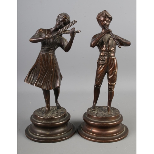 10 - A pair of late 20th century bronze figures of a boy and a girl playing musical instruments, after Fo... 