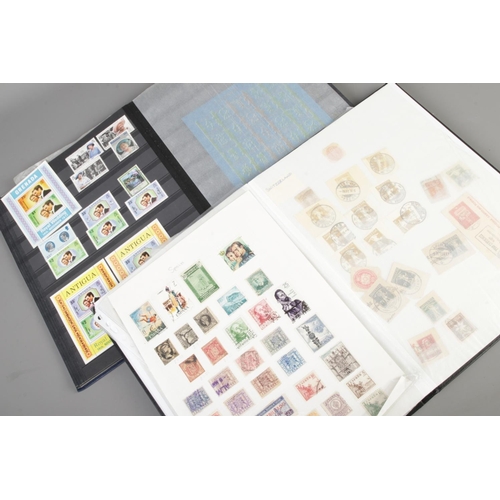 110 - Two stamp albums partially filled with stamps from around the world