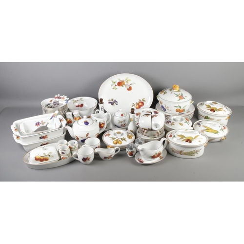 116 - A large collection of Royal Worcester Evesham dinner wares to include lidded tureens, tea pot, gravy... 