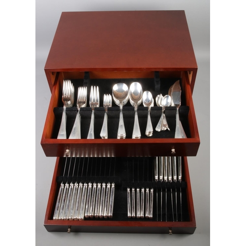 14 - A near complete cased four drawer Master Cutler of Sheffield six place canteen of cutlery, with drop... 