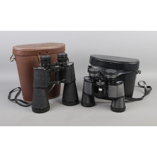 15 - Two cased sets of binoculars; Zenith 10x50 and Bresser Hunter 8x40.