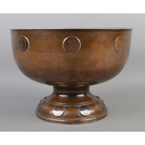 17 - A 19th century copper pedestal bowl decorated with inset 1799 copper farthing coins. Height 18cm, Di... 