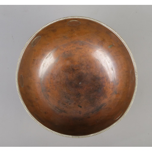 17 - A 19th century copper pedestal bowl decorated with inset 1799 copper farthing coins. Height 18cm, Di... 