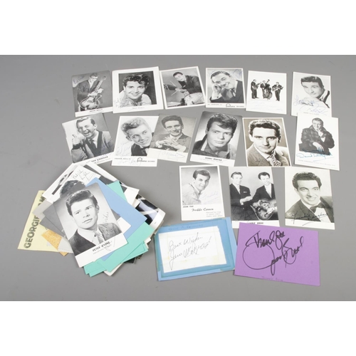 173 - A bag of autographed promotional cards and photographs, including Peter Elliott,  Dean Rogers, Keith... 