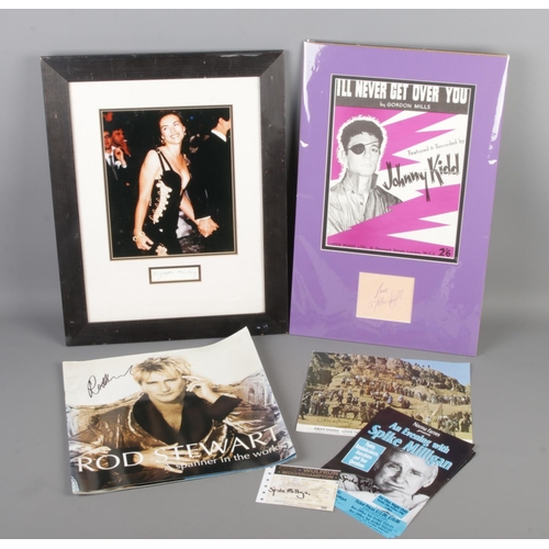 176 - A collection of autographs featuring Elizabeth Hurley (framed), Spike Milligan, Johnny Kidd (present... 