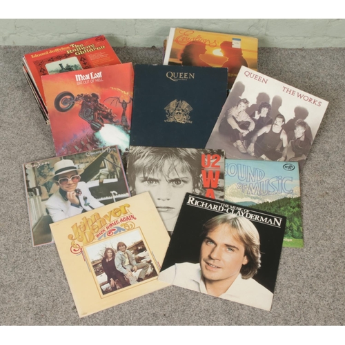 181 - Mixed collection of 80+ Vinyl Records, including Elton John, U2, Queen, John Denver, Meat Loaf etc.