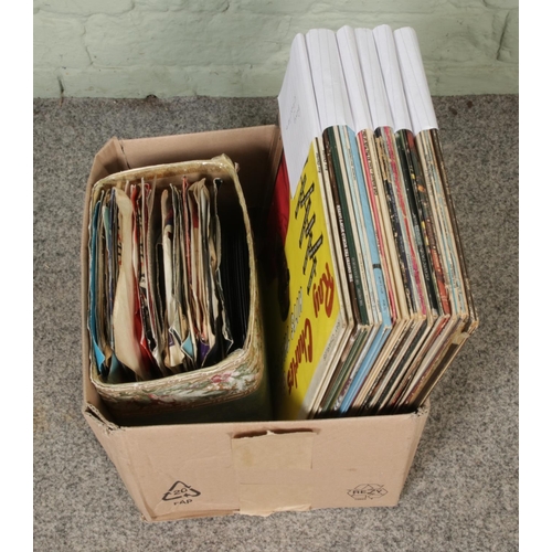 182 - One box of records with 7-inch single vinyl records, including Elvis, Rod Steward, Bryan Ferry, Clif... 