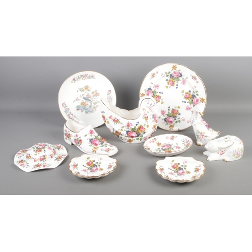 199 - A collection of mainly Fenton China Company decorative ceramics, gold rimmed with a floral pattern. ... 