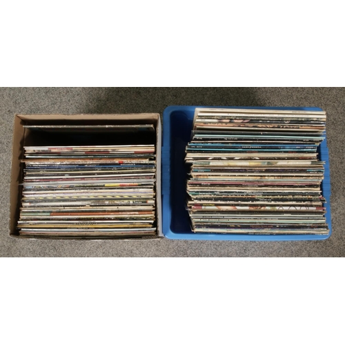 209 - Two boxes of 70's, 80's and 90's rock and pop records, to include Pink Floyd, The Who, Cher, Madonna... 