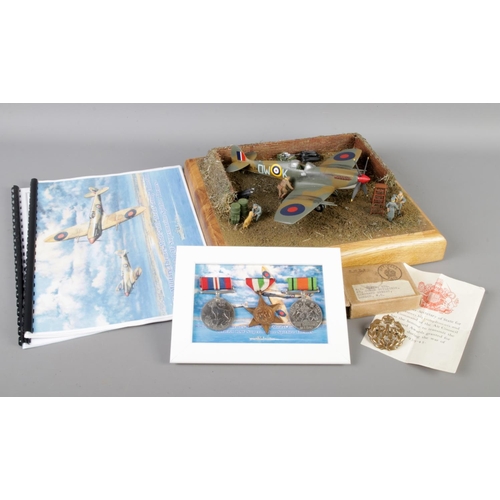 36 - Solid Oak Base British RAF Supermarine Spitfire Diorama with Medal Group Collection, including a han... 