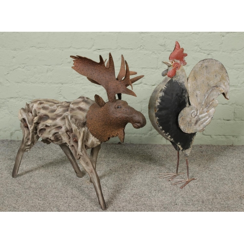 259 - A contemporary figure of a moose constructed from wood and iron with a sculpture of a chicken