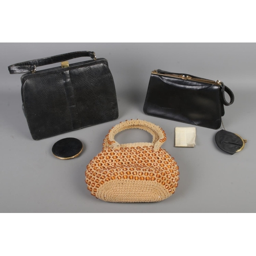 265 - Three vintage handbags; one containing a small mirror, another with powder compact.