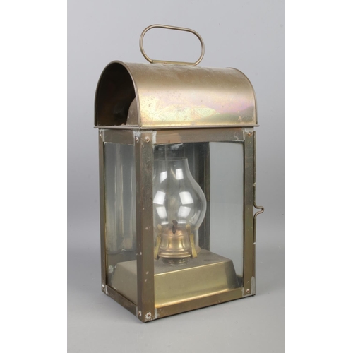 42 - A vintage ship's passageway/cabin lantern, with patterned back panel and complete with burner and gl... 