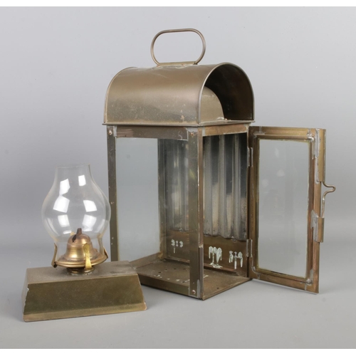 42 - A vintage ship's passageway/cabin lantern, with patterned back panel and complete with burner and gl... 