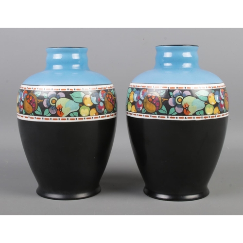 44 - A pair of early Twentieth Century vases, with banded border fruit. Stamped 'Made in England' and '14... 