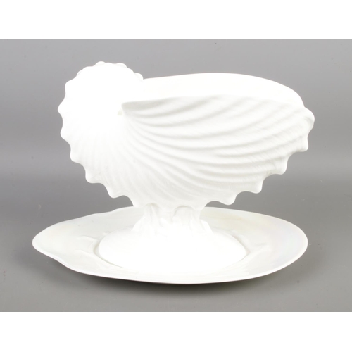 5 - A Wedgwood Nautilus Collection footed bowl formed as a shell raised on fitted dish; both pieces with... 