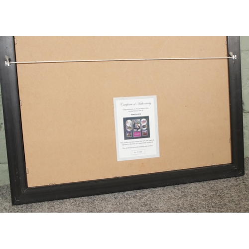 305 - A Pink Floyd framed limited edition CD display featuring four unboxed Minidisc's surrounding central... 