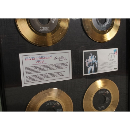 332 - A framed Elvis Presley limited edition gold coloured vinyl singles display titled 'Elvis Presley 196... 