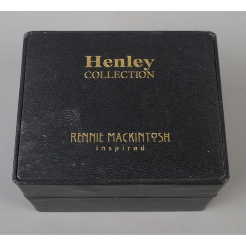 350 - A boxed Henley Collection Charles Rennie Mackintosh inspired bracelet and wristwatch gift set.