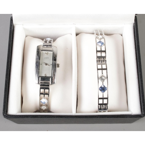 350 - A boxed Henley Collection Charles Rennie Mackintosh inspired bracelet and wristwatch gift set.