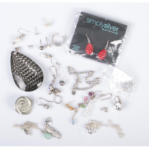 360 - An assorted collection of silver jewellery to include two necklaces, several odd earrings, dainty br... 