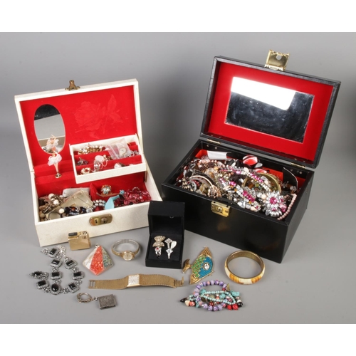 69 - Two vintage jewellery boxes containing a good collection of assorted costume jewellery and accessori... 