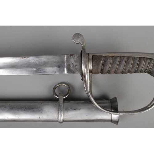 387 - A pair of Spanish cavalry swords with scabbards; the slightly curved blade marked for 'Ballesteros D... 