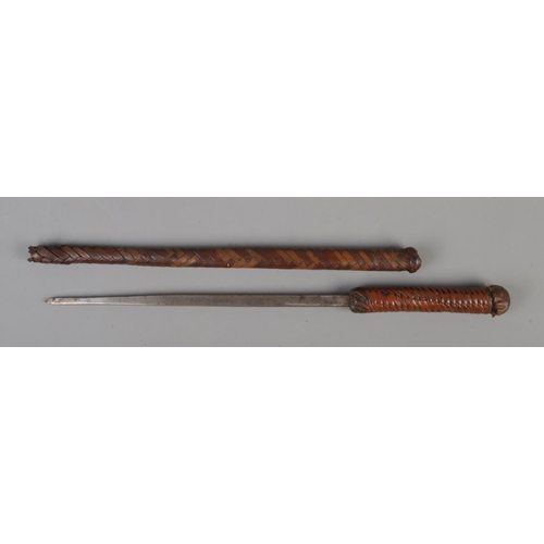 388 - An early 20th century leather wrapped sword swagger stick/riding crop. Length 44cm. CANNOT POST.