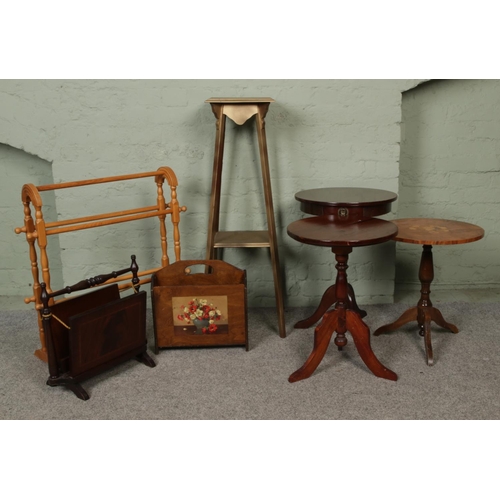 424 - A collection of assorted furniture to include small circular side tables, wooden towel rail, vintage... 