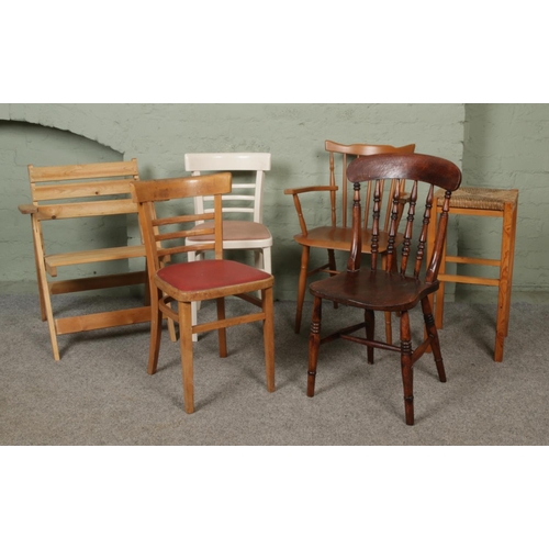 425 - A collection of assorted chairs, including folding garden chair, vintage Winsor chair, stool etc.