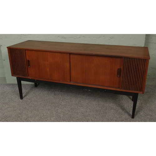 431 - A teak retro record player cabinet