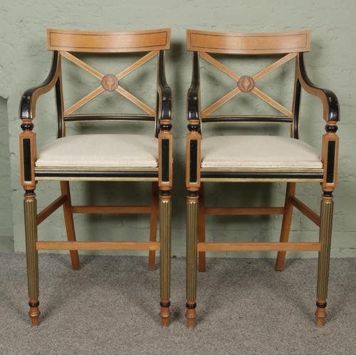 440 - A pair of Clive Christian style beech and ebonised high armchairs, with gilt highlights, X-form back... 