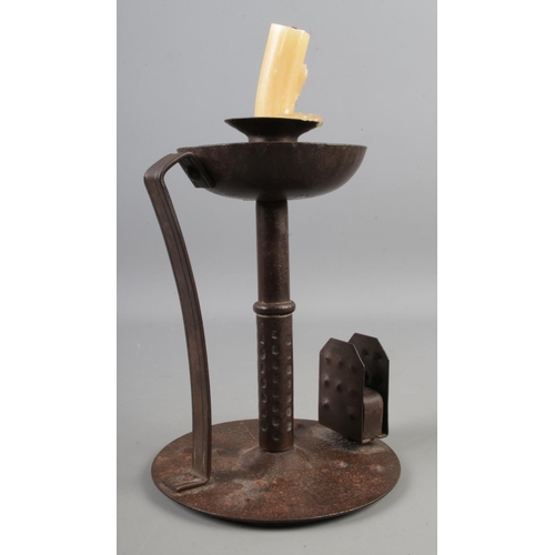 9 - An Arts & Crafts iron chamberstick designed by Hugo Berger manufactured by Goberg, Germany c.1908-19... 