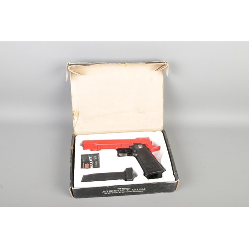 101 - A Galaxy G6 Full Metal Pistol 6mm BB Gun in red, length 22cm, boxed.