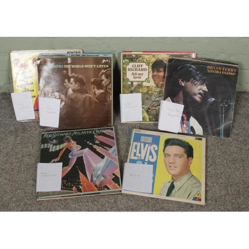 182 - One box of records with 7-inch single vinyl records, including Elvis, Rod Steward, Bryan Ferry, Clif... 