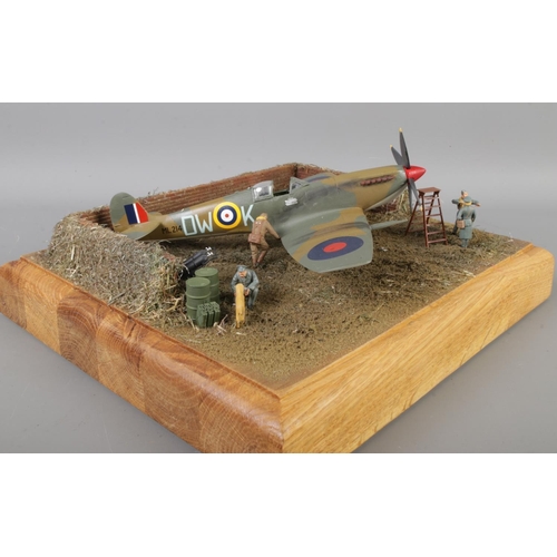 36 - Solid Oak Base British RAF Supermarine Spitfire Diorama with Medal Group Collection, including a han... 