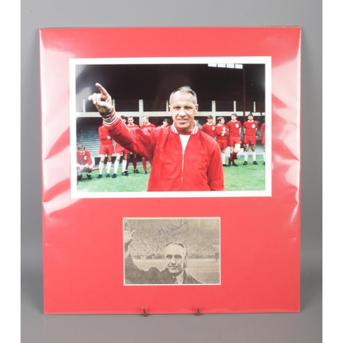 162 - A mounted and signed footballing display featuring Liverpool manager Bill Shankly, with large photog... 