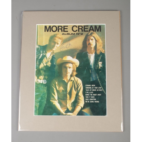 168 - A mounted album cover; More Cream, Album No.2, bearing signature for Eric Clapton, signed in pen. He... 