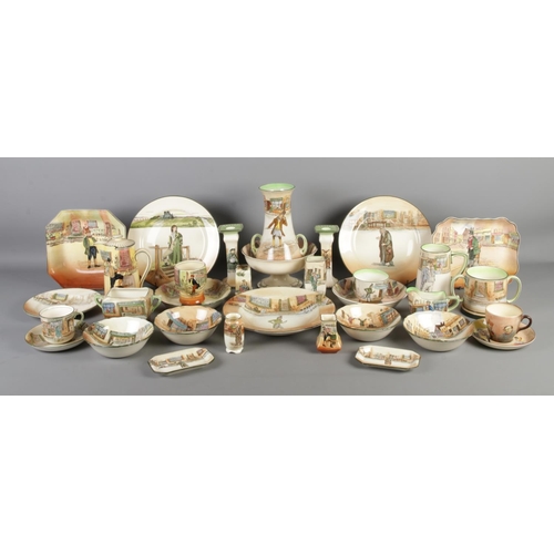 3 - A very large collection of Royal Doulton Dickens Ware ceramics, including a pair of candlesticks (Fa... 