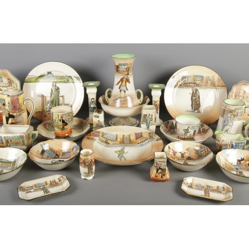 3 - A very large collection of Royal Doulton Dickens Ware ceramics, including a pair of candlesticks (Fa... 