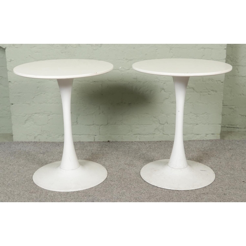 452 - Two retro style white tulip occasional tables. Approx. diameter 60.5cm, height 72.5cm.